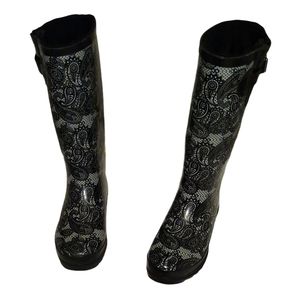 Black and white rain boots